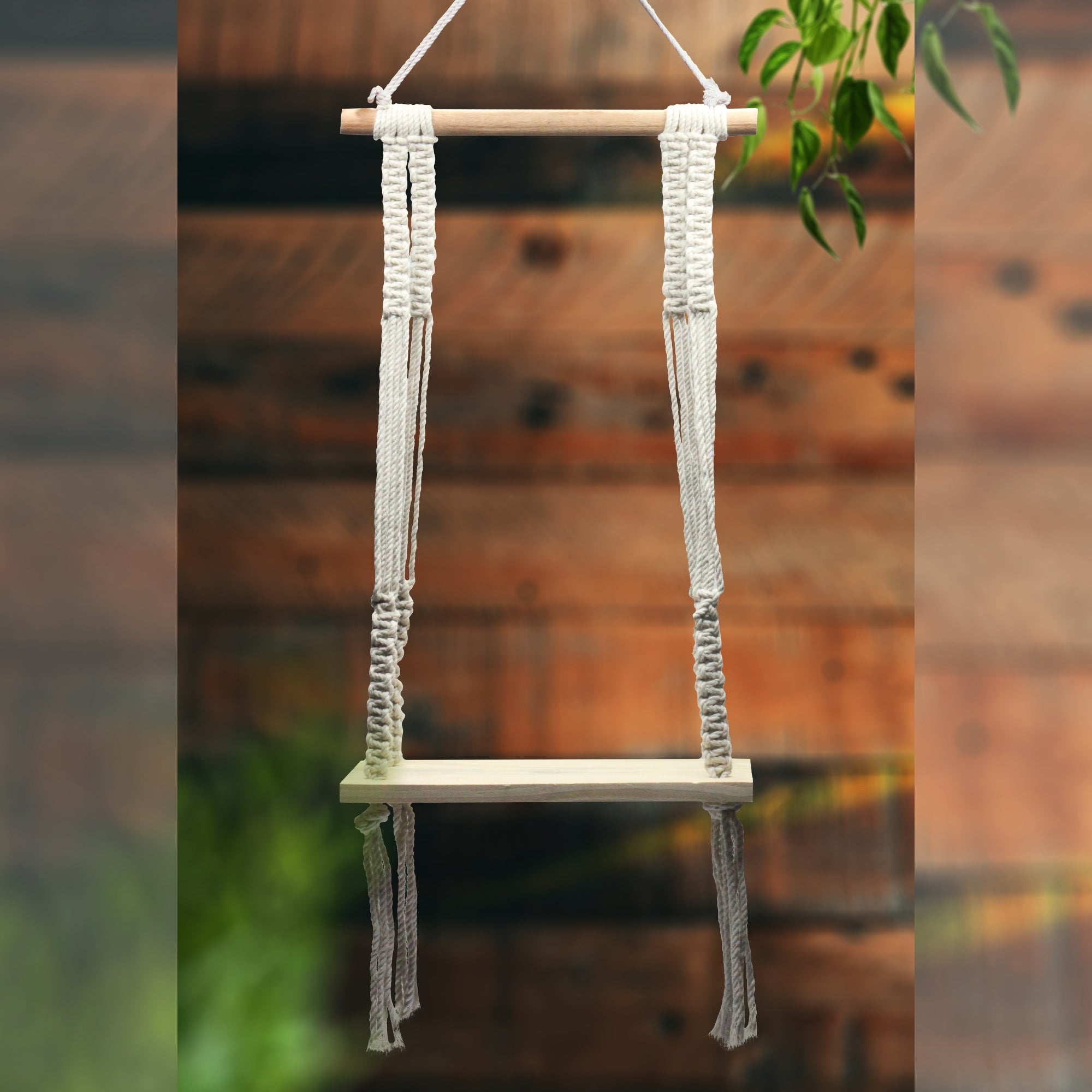 Macrame wall hanging with plank