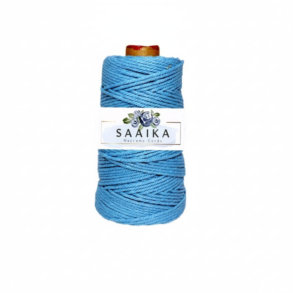 Blue macrame cord on a white background with 'Saaika' branding.