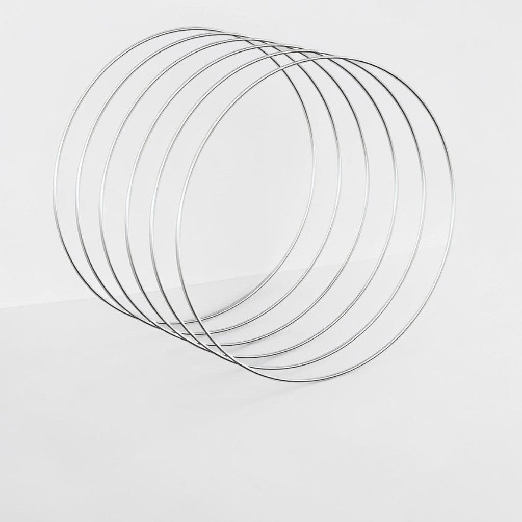 Saaika Crafts silver steel metal rings for macrame, dream catchers, and DIY craft projects on a white background.