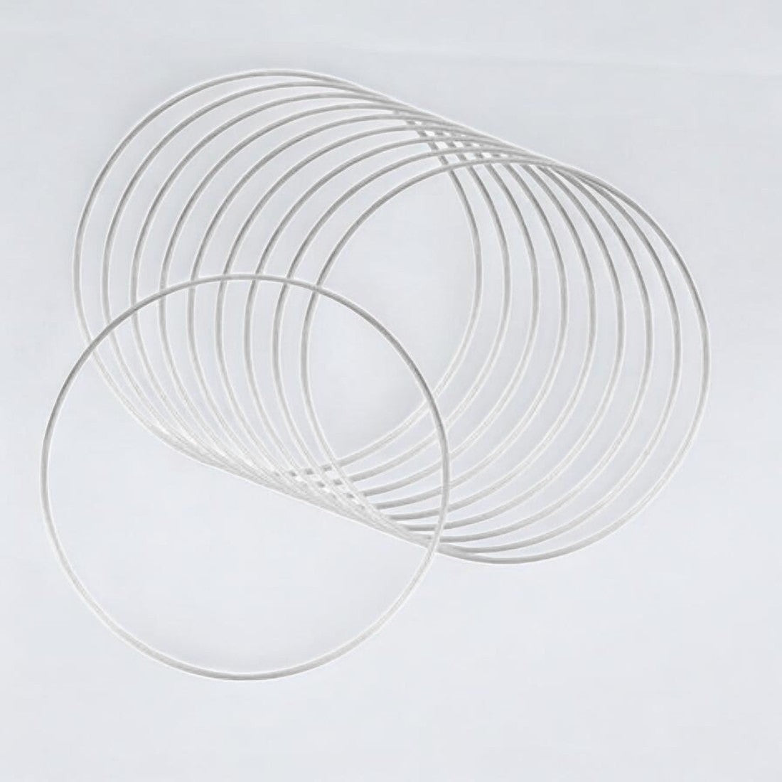 Saaika Crafts silver metal rings for macrame, dream catchers, and DIY craft projects on a white background.