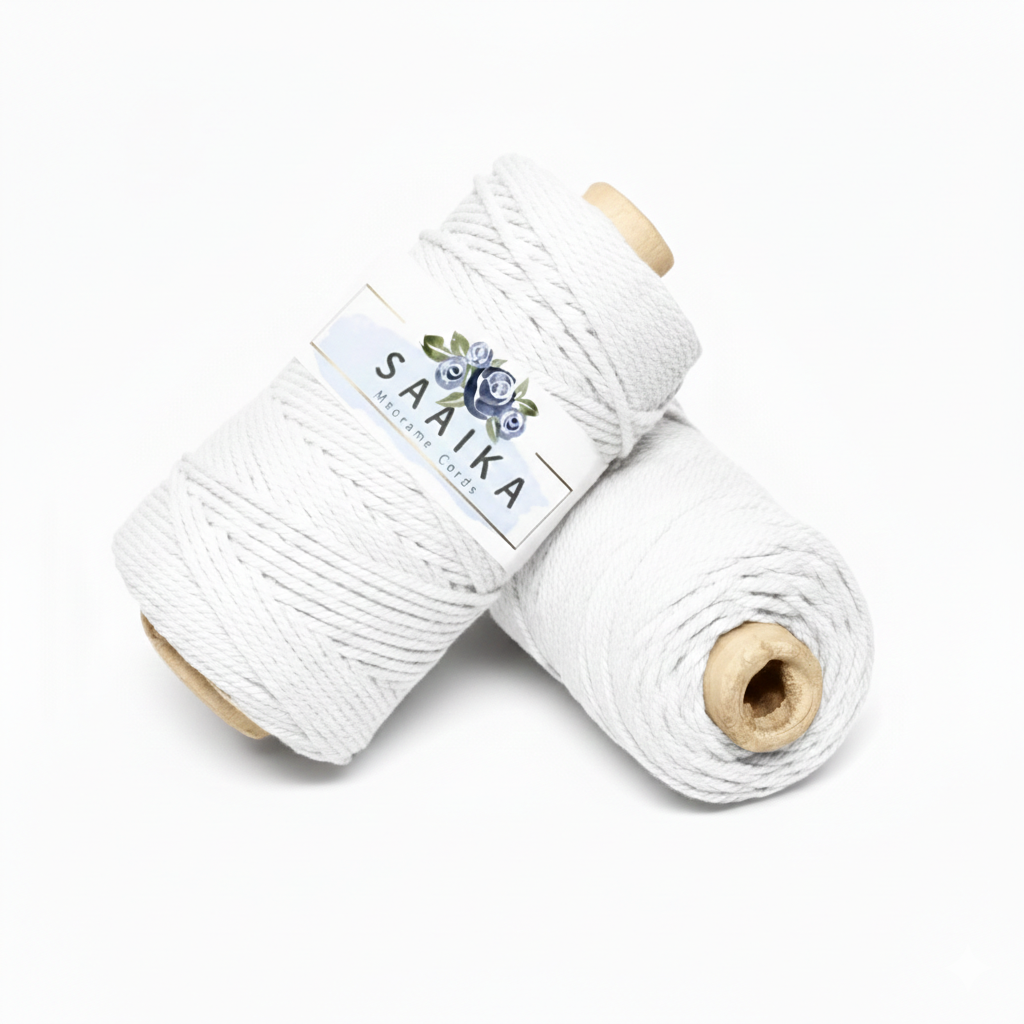 White twisted cotton macrame cord 3mm 3 ply, 120 meter roll by Saaika Crafts, ideal for handmade macrame wall hangings, plant hangers, bags and DIY craft projects.
